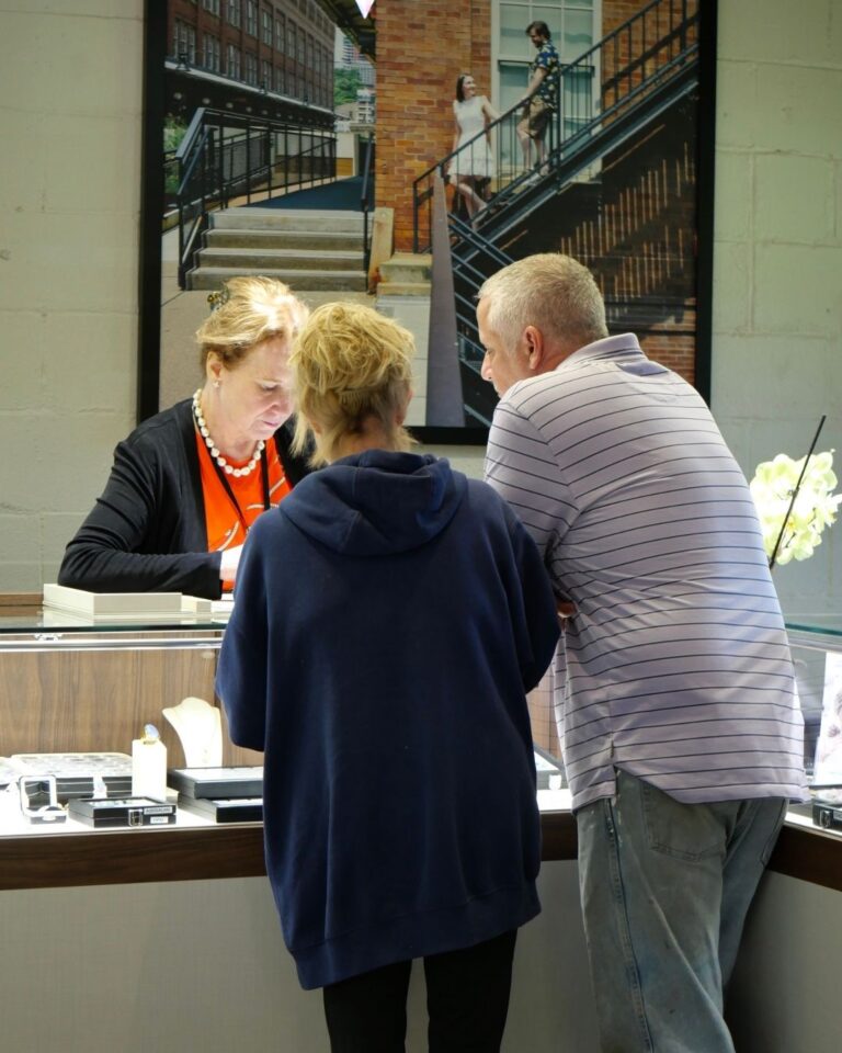 Guests viewing colored gemstone jewelry at JAB Jewelry Works