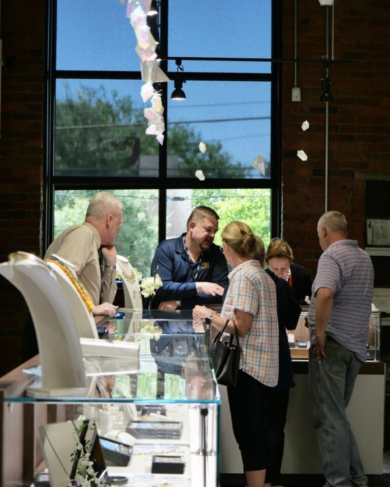 Rothschild Trading Company team presenting jewelry at trunk show