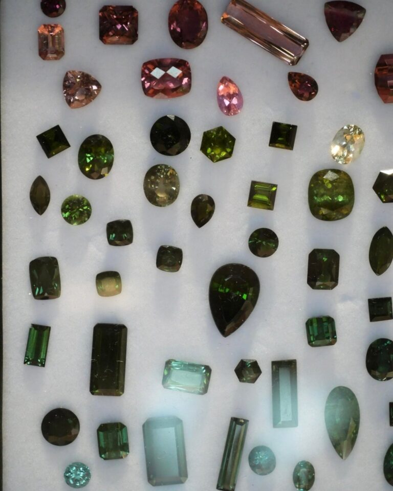 Loose colored gemstones displayed at Living in Color trunk show